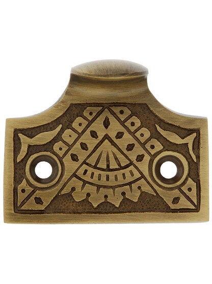 Cast Brass Oriental Pattern Sash Lift In Antique Brass Finish.